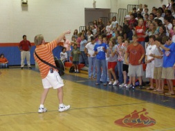 Joey Nicholson leading worship during FCA